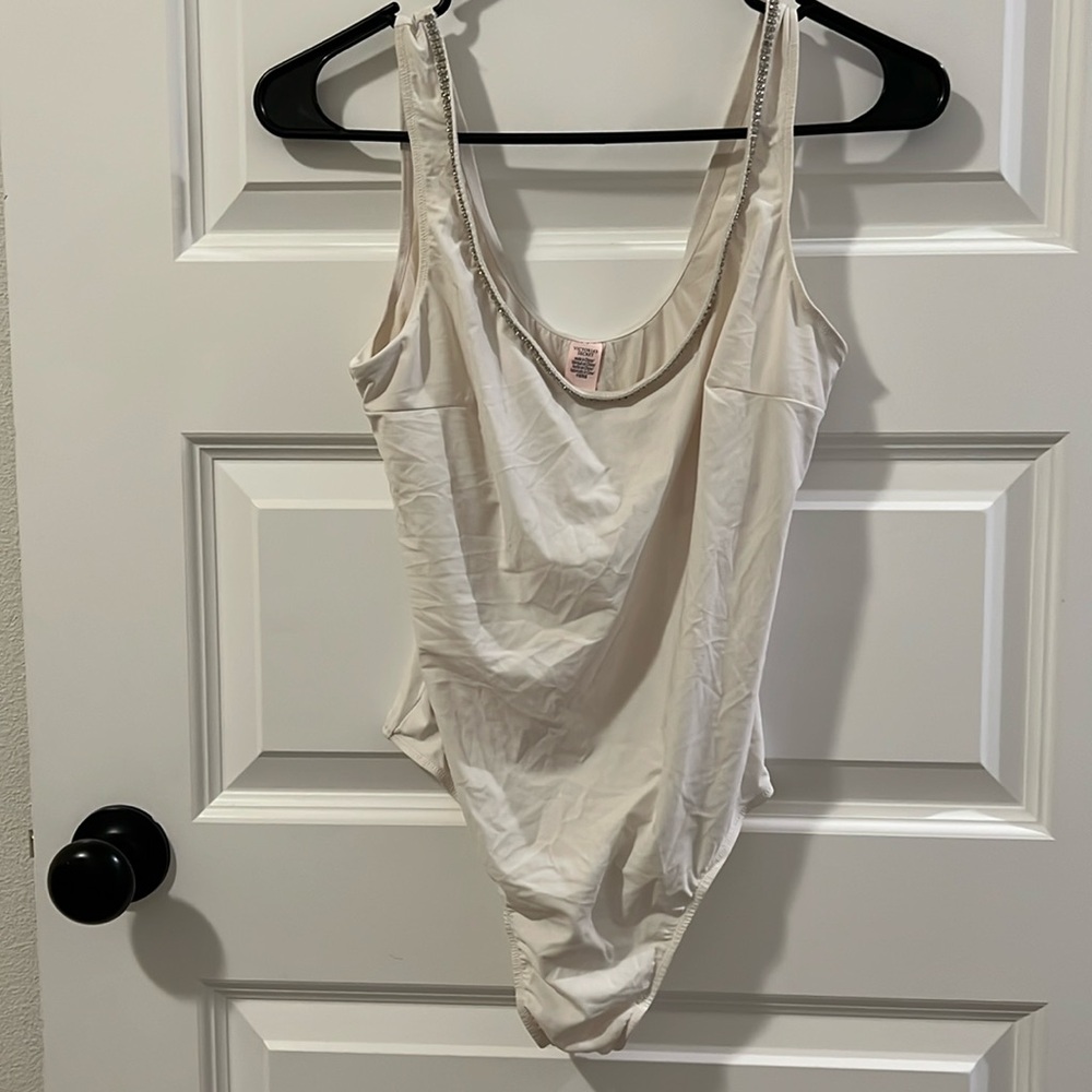 Victorias Secret size medium Jewel thong bodysuit, perfect condition.